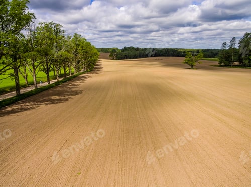 Preview: Drone Image. Aerial View Of Rural Area With Freshly Cultivated Fields. Green And Brown. Summer