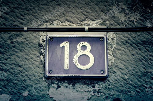 Preview: Number Eighteen, Detail Of A Number On A Wall In The City, And Figures Signal