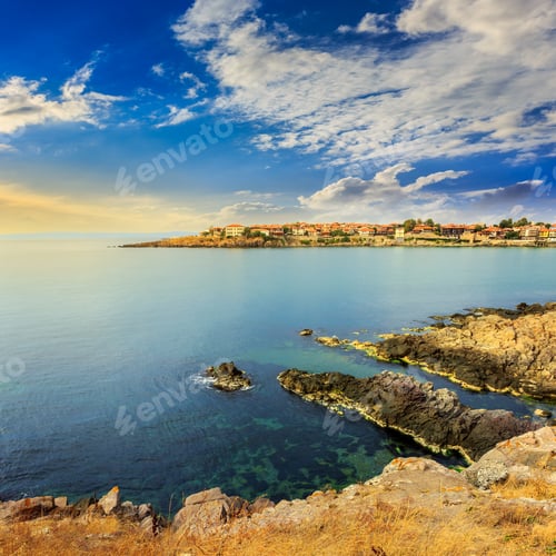 Preview: Ancient European City On A Rocky Shore Near Sea In Summer At Sunrise