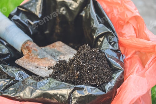 Preview: Garden Shovel And Peat. Spring Work In The Garden