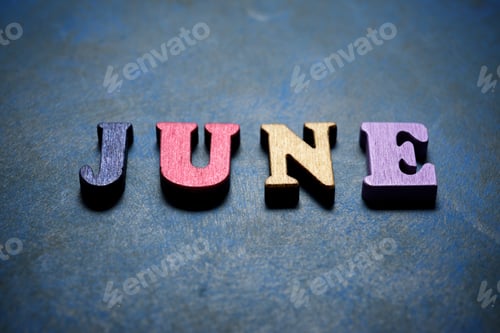 Preview: June Word On A Blue Table.