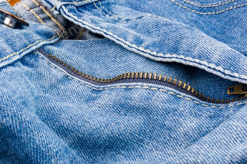 Preview: Clothing Items Blue Stonewashed Faded Jeans Cotton Fabric Texture With Seams, Clasps, Buttons And