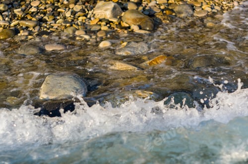 Preview: Pebble Stones On The Sea Beach, The Rolling Waves Of The Sea With Foam