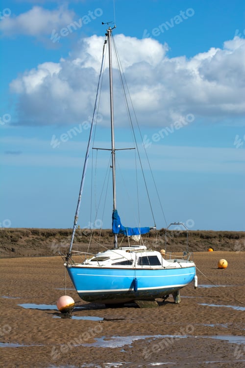 Preview: Small Boats Stranded At Low Tide At Wells Next The Sea, Norfolk, Uk