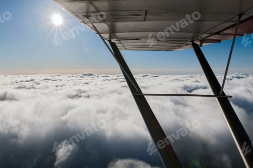 Preview: Aerial View From Airplane Over The Clouds And Sky