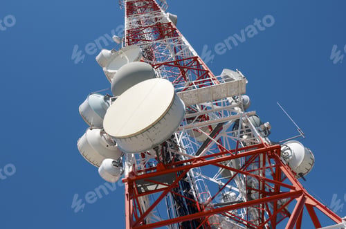 Preview: Bottom View Of A Telecommunications Tower With A Clear Blue Sky