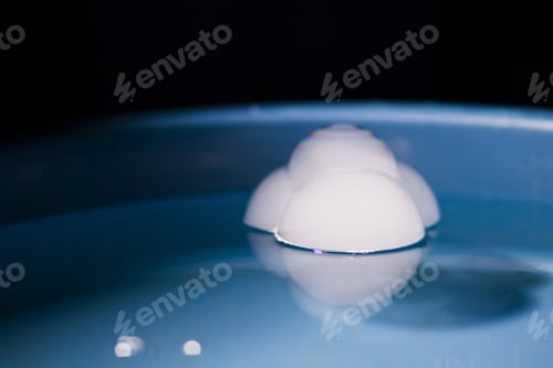 Preview: Abstract Shot With Big Soap Bubbles On A Water Surface With Smoke Inside. Image Has Grain Texture