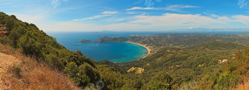 Preview: Beautiful Panoramic Shot Of Paradise Bay With Blue Water And Sky And Green Mountains. Corfu. Greek