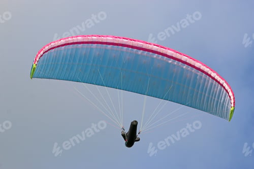 Preview: Paraglider Flying Wing In A Blue Sky