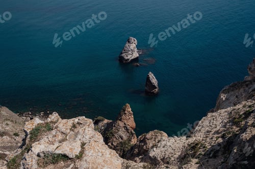 Preview: Beautiful View From The Cliff On The Blue Sea. Incredible Coast With Freestanding Cliffs In The