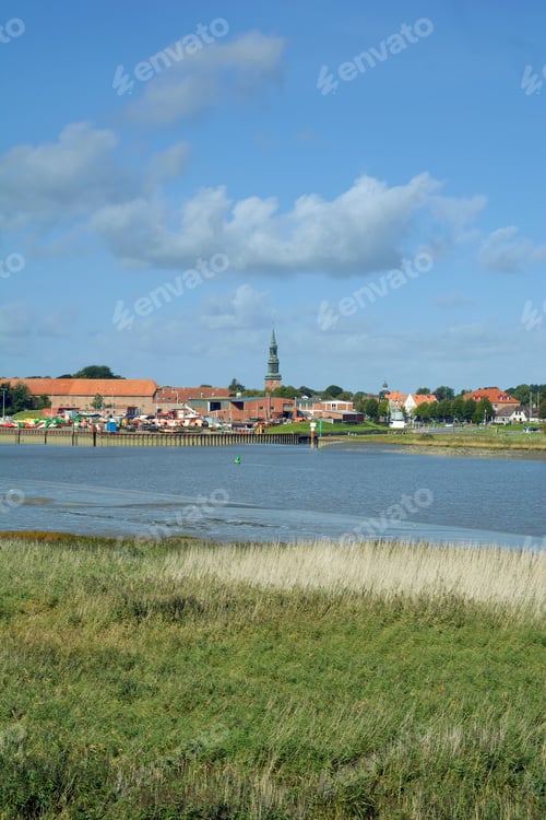 Preview: View Over Eider River To Village Of Toenning In North Frisia,Schleswig-Holstein,Germany