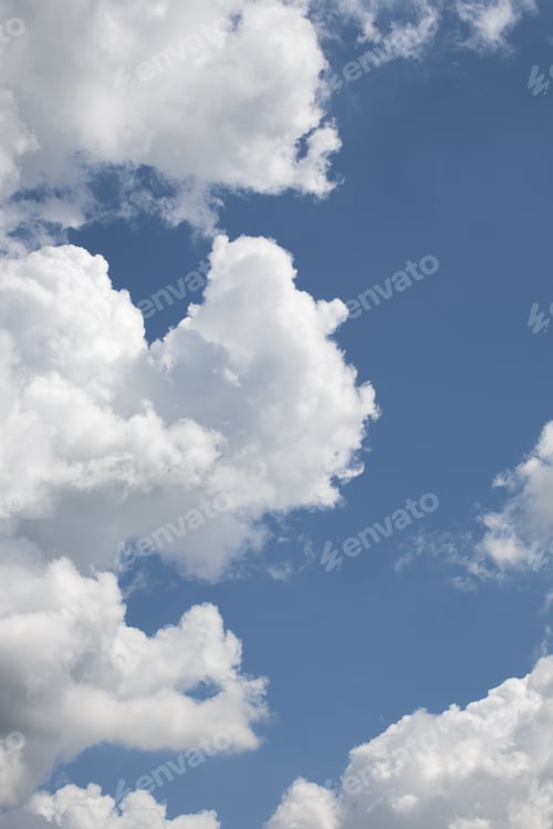 Preview: Beautiful, Fluffy, White And Grey Clouds And Blue Sky