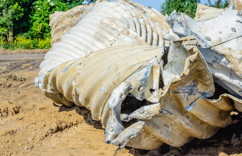 Preview: Closeup Of Old And Dirty Corrugated Steel Distorted And Piled In A Nature Reserve.