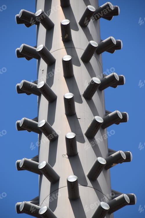 Preview: Gray Pillar With Cones Against A Blue Sky