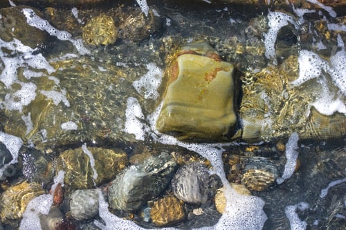 Preview: Rocky Sea Shore With Pebble Beach, Transparent Waves With Foam, On A Warm Summer Day