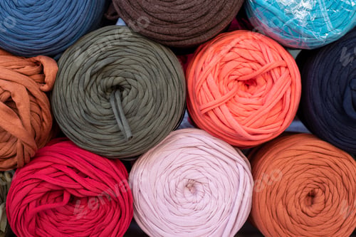 Preview: Rolled Stylish Comfort And Colourful Blankets Stored On Top Of Each Other. Rolled Blankets In A