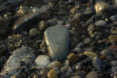 Preview: Pebble Stones On The Sea Beach, The Rolling Waves Of The Sea With Foam