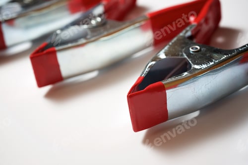 Preview: Clamps On A White Table
