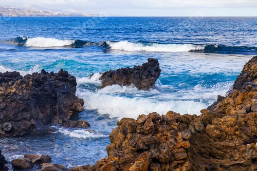 Preview: The Picturesque Rock At The Coast Of The Atlantic Ocean Is Washed By Waves