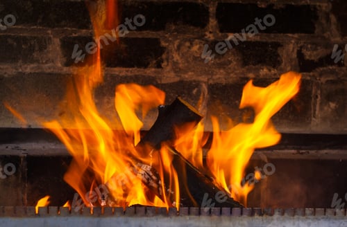 Preview: Heating, Warmth, Fire And Cosiness Concept - Close Up Of Burning Fireplace At Home