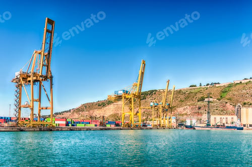 Preview: Container Cranes For Loading And Unloading Container Ships At The Commercial Port Of Barcelona