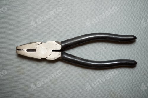 Preview: Pliers On A Stone Table