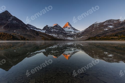 Preview: Mount Assiniboine And Lake Magog Sunrise In Larch Season
