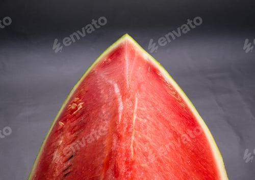 Preview: A Quarter Of A Ripe Watermelon On A Black Background