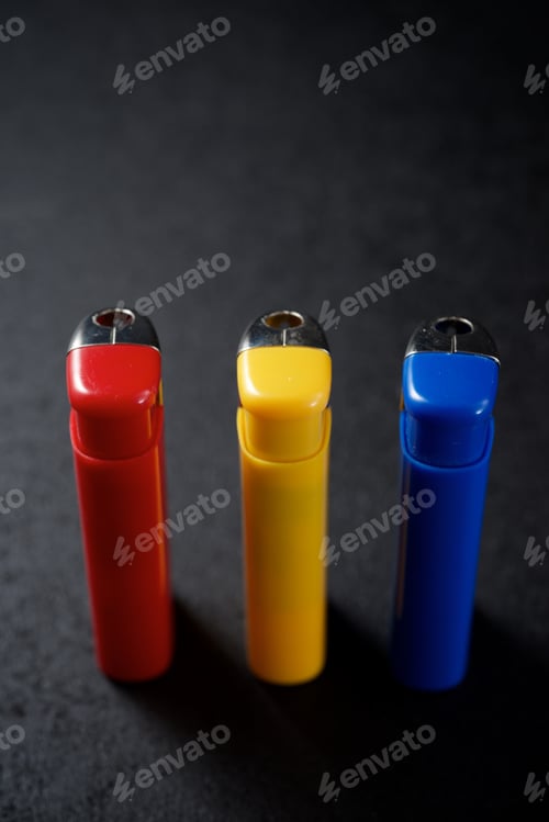 Preview: Lighters On A Black Table.