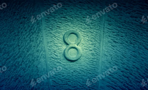 Preview: Number Eight Pair Of Information, Sign Detail On A Stone Wall