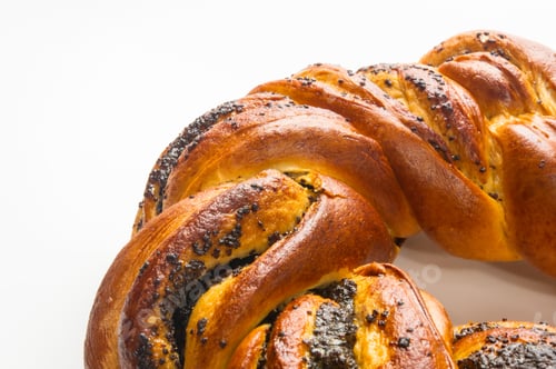 Preview: Braided Poppy Seed Round Loaf On White Background
