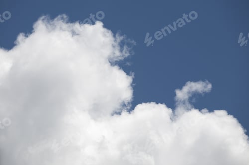 Preview: Beautiful, Fluffy, White And Grey Clouds And Blue Sky