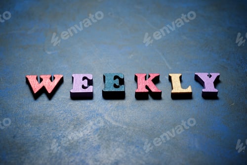 Preview: Weekly Word On A Blue Table.