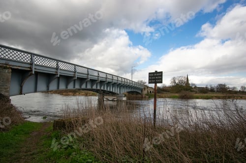 Preview: Steel Bridge Across A Swollen River