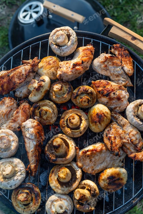 Preview: Mushrooms And Chicken Are Grilled In The Garden