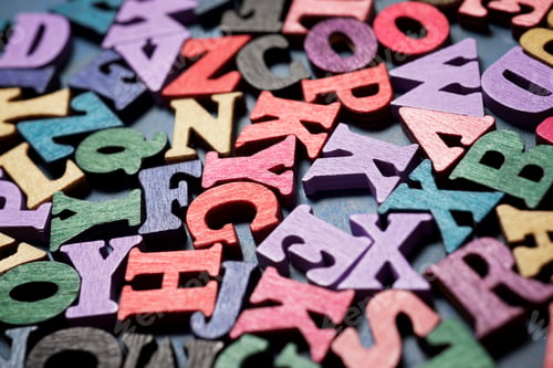 Preview: Wood Letters On A Blue Table.