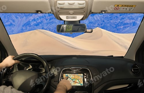 Preview: Driving A Car While Using The Touch Screen Of A Gps Navigation System Towards Sand Dunes, In The