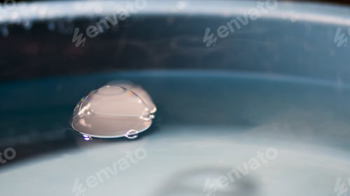 Preview: Abstract Shot With Big Soap Bubbles On A Water Surface With Smoke Inside. Image Has Grain Texture