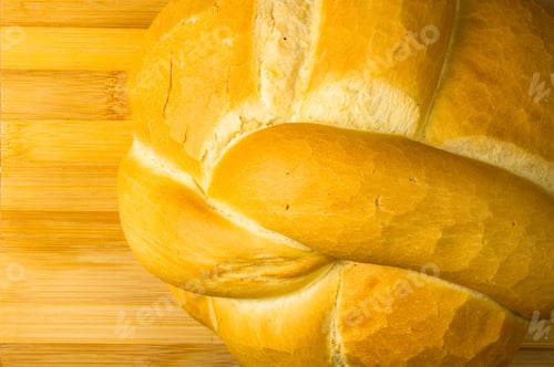 Preview: Fresh Braided Loaf Of White Wheat Bread On Bamboo Wooden Background