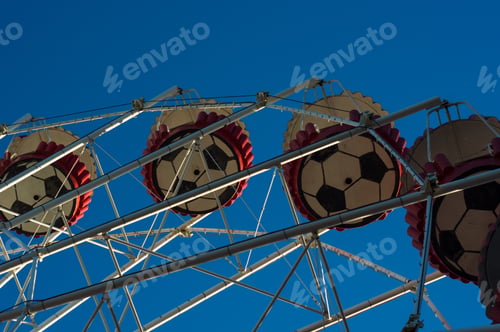 Preview: Attractions In Spring City Park - Ferris Wheel Over Blue Sky