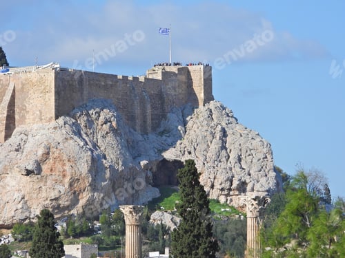 Preview: Extreme Zoom Of Iconic Acropolis Hill Greek Waving Flag As Seen From Great Distance