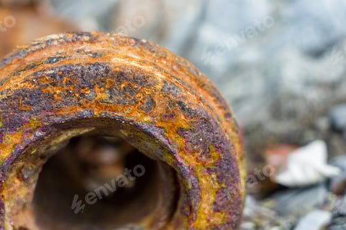 Preview: Very Rusty Metal On A Gray Cracked Rock