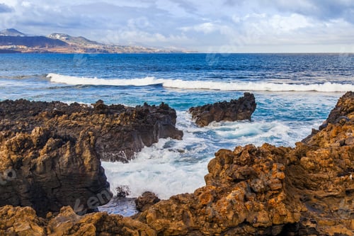 Preview: The Picturesque Rock At The Coast Of The Atlantic Ocean Is Washed By Waves