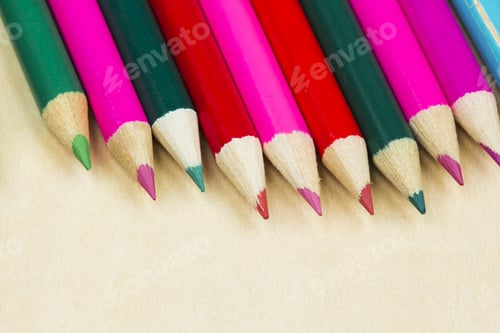 Preview: Group Of Sharp Colored Pencils With Wooden Background