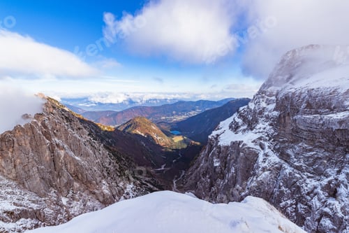 Vista previa: Autumn Meets Winter At The Top Of Mangart Mountain In Slovenia. October Is A Mix Of Two Seasons In