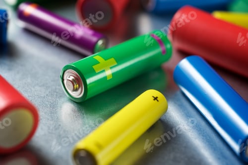 Preview: Many Batteries On A Metal Table.