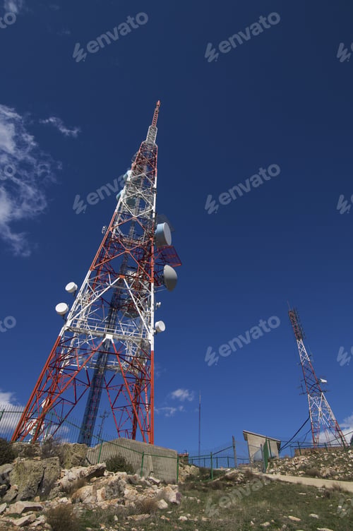 Preview: Two Telecommunications Tower In White And Red
