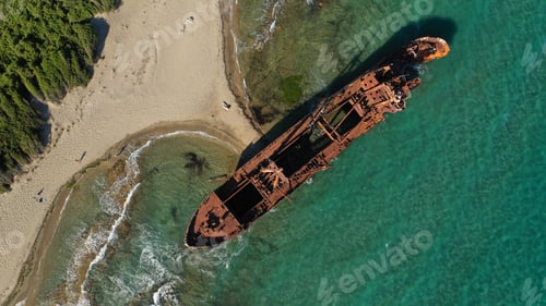 Preview: Aerial Drone Photo Of Old Shipwreck Abandoned To Rust In Mediterranean Bay