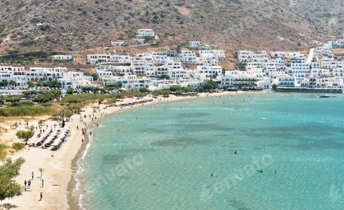 Preview: Sifnos, Greece - July 31 2016: Swimmers At Kamares Beach Enjoying The Summer Holidays At The Greek