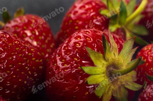 Preview: Fresh Ripe Berries Strawberries On Black Ceramic Plate On White Background, Macro Photo